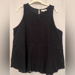 Black lace peplum sleeveless top.